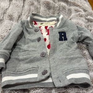 Monica + Andy lobster jacket with initial “R”